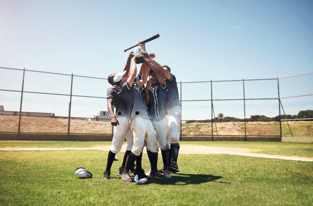 Baseball players celebrating a win.
